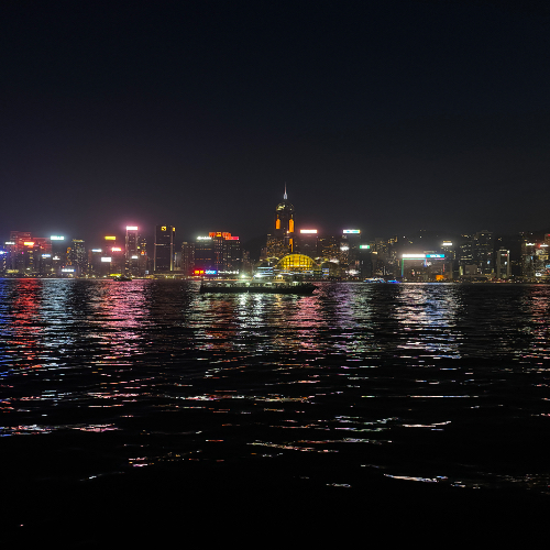 Hong Kong skyline at night across Victoria Harbour